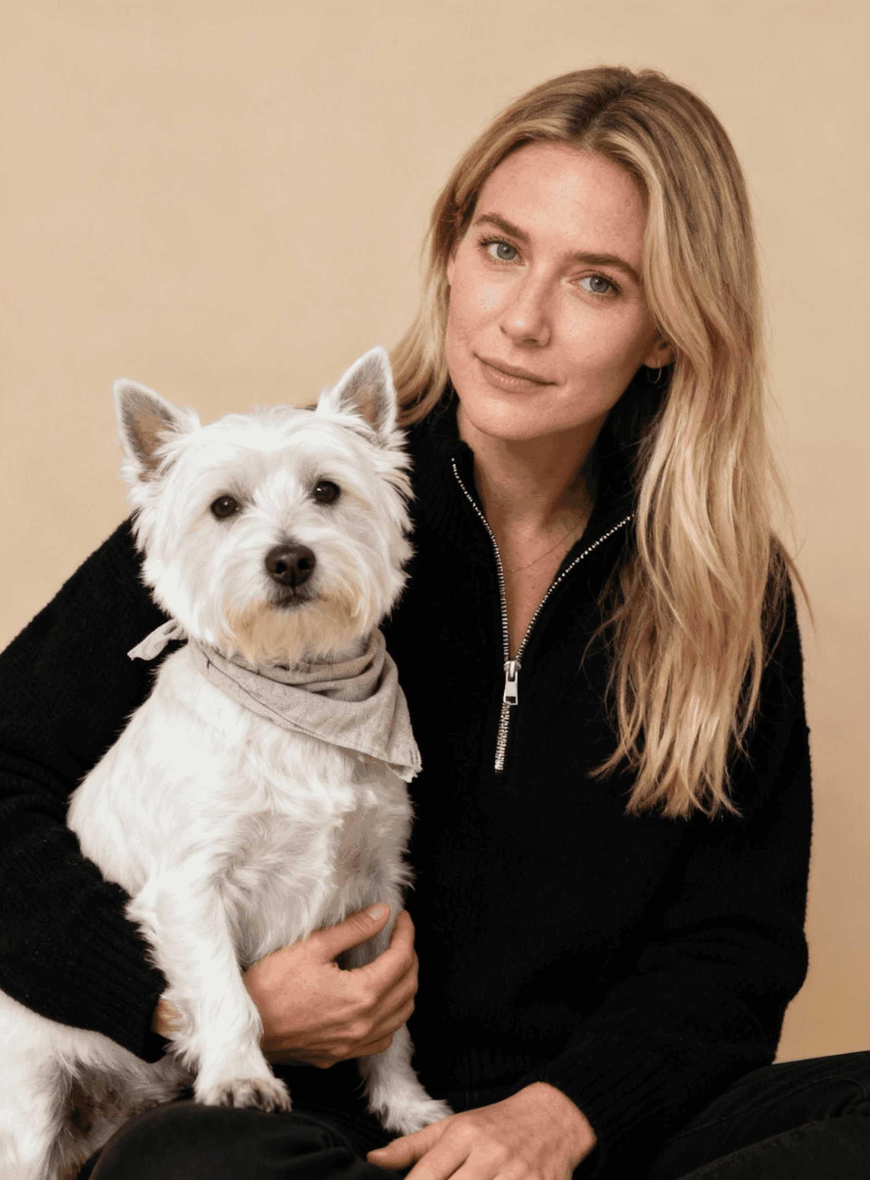 portrait shot of a puppy and its owner